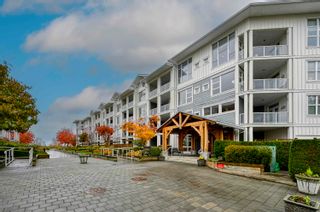 Photo 2: 313 4500 WESTWATER Drive in Richmond: Steveston South Condo for sale in "COOPER SKY" : MLS®# R2832185