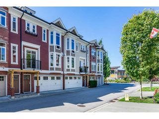 Photo 1: 4 20738 84 Avenue in Langley: Willoughby Heights Townhouse for sale in "Yorkson Creek" : MLS®# R2395549