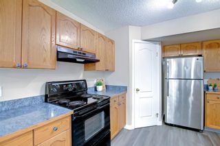 Photo 12: 104 Panamount Heights NW in Calgary: Panorama Hills Detached for sale : MLS®# A2004311