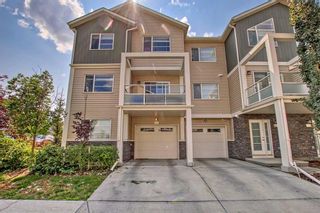 Photo 1: 641 Redstone View NE in Calgary: Redstone Row/Townhouse for sale : MLS®# A2076101