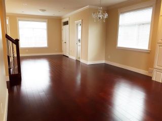 Photo 2: 4866 MOSS Street in Vancouver: Collingwood VE House for sale (Vancouver East)  : MLS®# R2227855