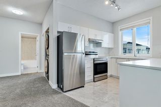 Photo 1: 1401 1140 Taradale Drive NE in Calgary: Taradale Apartment for sale : MLS®# A2011784