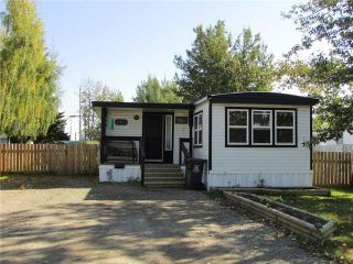 Photo 1: 8819 75TH Street in Fort St. John: Fort St. John - City SE Manufactured Home for sale in "ANNEOFIELD" (Fort St. John (Zone 60))  : MLS®# N230729
