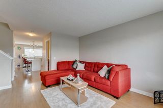Photo 3: 127 Fireside Parkway: Cochrane Row/Townhouse for sale : MLS®# A1212822