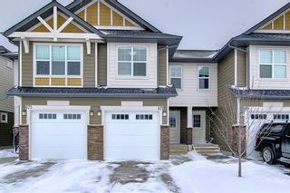 Photo 2: 671 101 Sunset Drive: Cochrane Row/Townhouse for sale : MLS®# A2010546