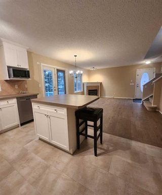Photo 3: 406 Coral Cove NE in Calgary: Coral Springs Row/Townhouse for sale : MLS®# A2098781
