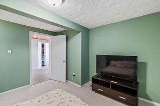 Photo 27: 411 Queensland Circle SE in Calgary: Queensland Detached for sale : MLS®# A1193029