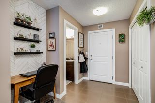 Photo 3: 4115 403 Mackenzie Way SW: Airdrie Apartment for sale : MLS®# A1190086