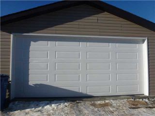 Photo 3: 1303 NEW BRIGHTON Drive SE in Calgary: New Brighton Residential Detached Single Family for sale : MLS®# C3645274