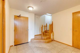 Photo 2: 426 7229 Sierra Morena Boulevard SW in Calgary: Signal Hill Apartment for sale : MLS®# A2096225