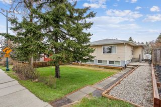 Photo 2: 919 32 Avenue NW in Calgary: Cambrian Heights 4 plex for sale : MLS®# A2129137