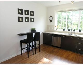 Photo 2: 27 550 BROWNING Place in North_Vancouver: Seymour Townhouse for sale in "TANAGER" (North Vancouver)  : MLS®# V753076