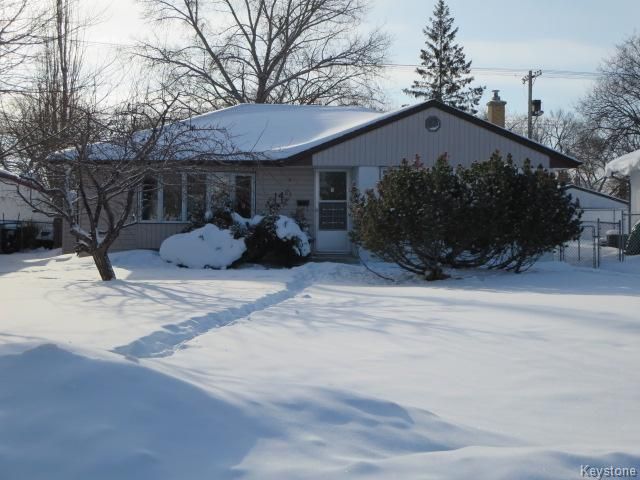 Lovingly Cared For 1074 Sq.ft. Bungalow situated on a Quiet Crescent with Newer Shingles, Eaves (04), Soffit & Fascia.