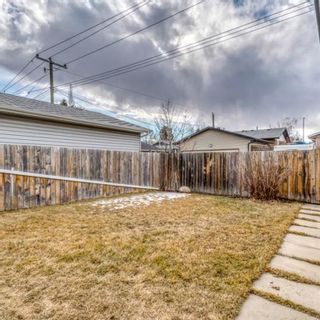 Photo 4: 8059 Huntington Street NE in Calgary: Huntington Hills Detached for sale : MLS®# A1196021