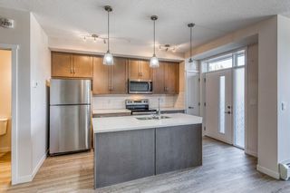 Main Photo: 12 30 Shawnee Common SW in Calgary: Shawnee Slopes Apartment for sale : MLS®# A2123625