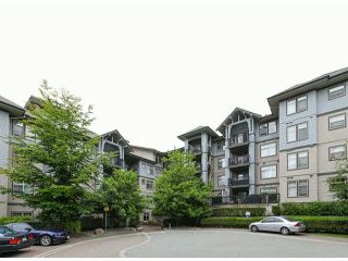 Photo 1: 201 2988 SILVER SPRINGS Boulevard in Coquitlam: Westwood Plateau Condo for sale in "TRILLIUM" : MLS®# V1072071