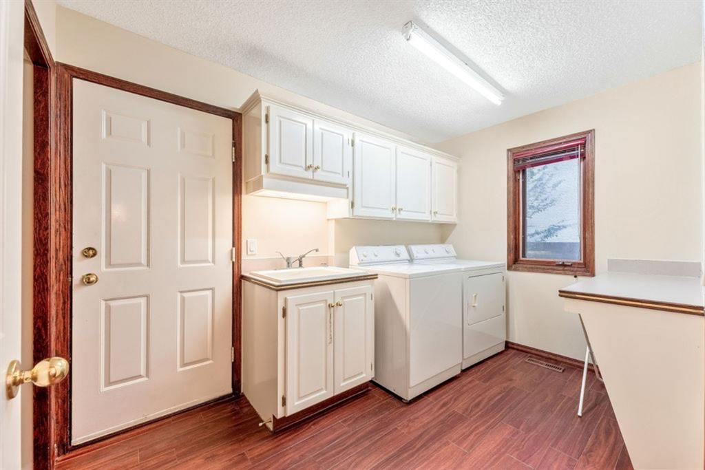 Photo 29: Photos: 217 Signature Way SW in Calgary: Signal Hill Detached for sale : MLS®# A1148692