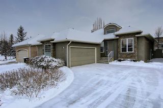 Photo 1: 1713 Evergreen Drive SW in Calgary: Evergreen Detached for sale : MLS®# A1184782