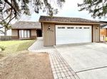 Main Photo: 3344 Palliser Drive SW in Calgary: Oakridge Detached for sale : MLS®# A2114409
