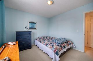 Photo 36: 133 Cougarstone Place SW in Calgary: Cougar Ridge Semi Detached for sale : MLS®# A1050548