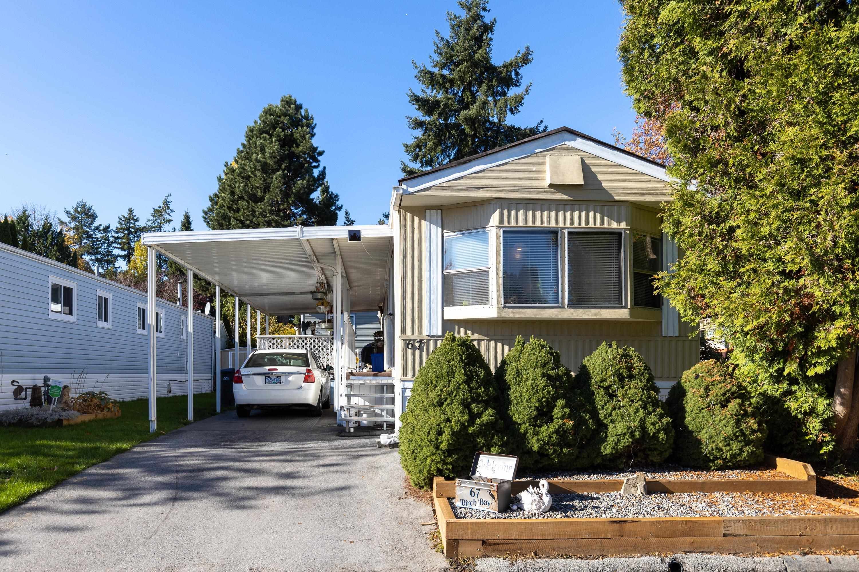 Main Photo: 67 7790 KING GEORGE Boulevard in Surrey: East Newton Manufactured Home for sale in "Crispen Bays" : MLS®# R2629702