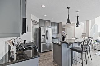 Photo 7: 71 Cougarstone Court SW in Calgary: Cougar Ridge Detached for sale : MLS®# A1165895