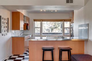 Main Photo: 1 1634 18 Avenue NW in Calgary: Capitol Hill Apartment for sale : MLS®# A1220050