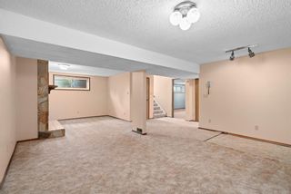 Photo 27: 306 Whitney Crescent SE in Calgary: Willow Park Detached for sale : MLS®# A1245173