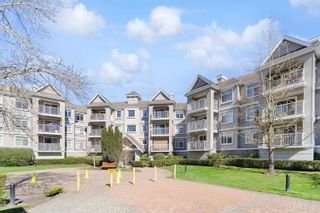 Photo 1: 302 20896 57 Avenue in Langley: Langley City Condo for sale in "Bayberry Lane" : MLS®# R2762942