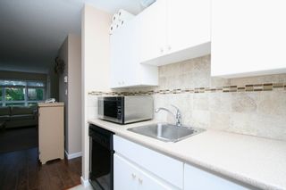 Photo 13: 207 4950 MCGEER Street in Vancouver: Collingwood VE Condo for sale in "Carleton" (Vancouver East)  : MLS®# V974793