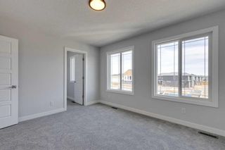 Photo 11: 82 Hotchkiss Manor SE in Calgary: C-385 Detached for sale : MLS®# A2101092