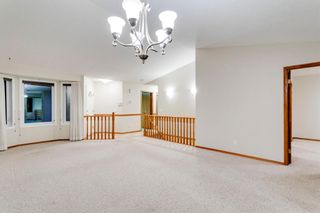 Photo 4: 165 Arbour Cliff Close NW in Calgary: Arbour Lake Semi Detached (Half Duplex) for sale : MLS®# A1237099