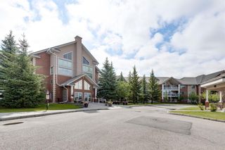 Photo 2: 306 6868 Sierra Morena Boulevard SW in Calgary: Signal Hill Apartment for sale : MLS®# A1158543