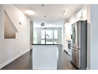 Photo 7: 21 13864 HYLAND Road in Surrey: East Newton Townhouse for sale in "TEO" : MLS®# F1450968