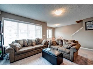 Photo 6: 113 WINDSTONE Mews SW: Airdrie House for sale : MLS®# C4016126