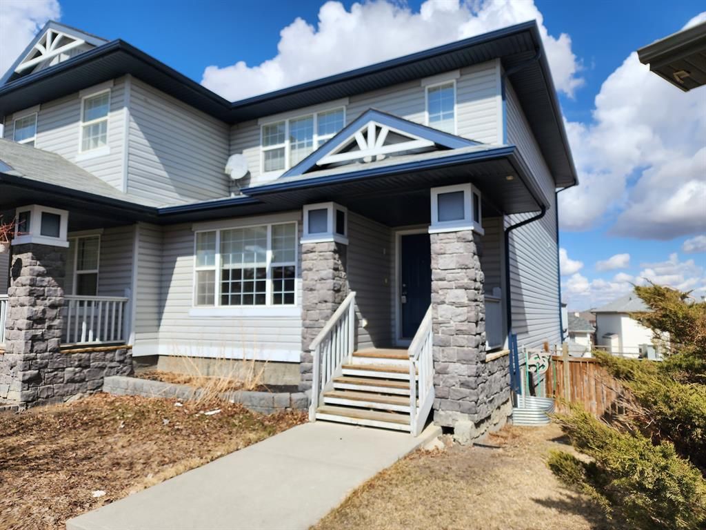 Main Photo: 46 Panamount Square NW in Calgary: Panorama Hills Semi Detached (Half Duplex) for sale : MLS®# A2040526