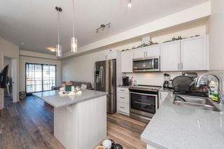 Main Photo: 3406 298 Sage Meadows Park NW in Calgary: Sage Hill Apartment for sale : MLS®# A2104180