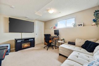 Photo 24: 127 Everhollow Heights SW in Calgary: Evergreen Row/Townhouse for sale : MLS®# A2127215