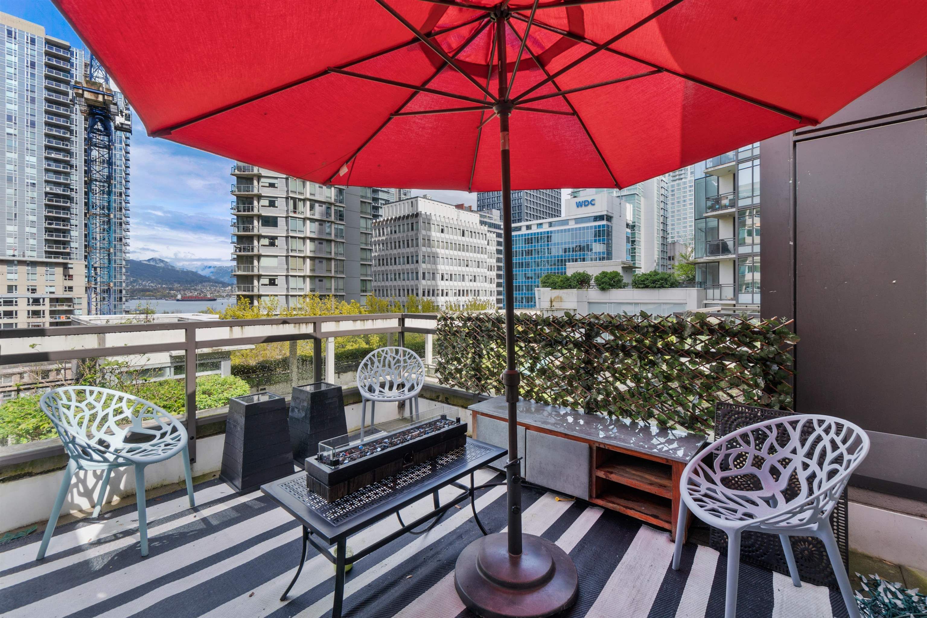 Main Photo: 304 1211 MELVILLE Street in Vancouver: Coal Harbour Townhouse for sale in "THE RITZ" (Vancouver West)  : MLS®# R2681290