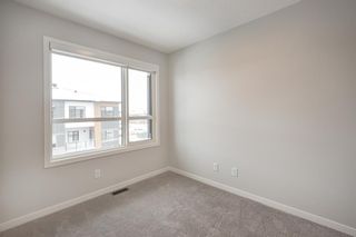 Photo 15: 146 42 Cranbrook Gardens SE in Calgary: Cranston Row/Townhouse for sale : MLS®# A2010110