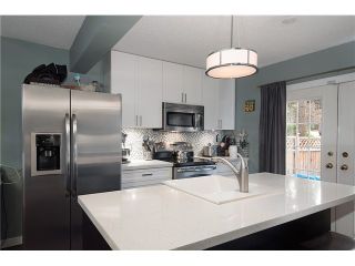 Photo 1: 214 BALMORAL Place in Port Moody: North Shore Pt Moody Townhouse for sale : MLS®# V1056784