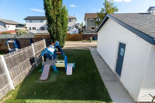 Photo 34: 312 Woodside Circle NW: Airdrie Detached for sale : MLS®# A1240551