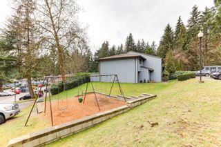 Photo 32: 916 BRITTON Drive in Port Moody: North Shore Pt Moody Townhouse for sale in "WOODSIDE VILLAGE" : MLS®# R2659085