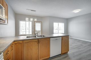 Photo 12: 206 Prestwick Landing SE in Calgary: McKenzie Towne Row/Townhouse for sale : MLS®# A2023719
