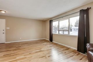 Photo 5: 326 Whitney Crescent SE in Calgary: Willow Park Detached for sale : MLS®# A1229930