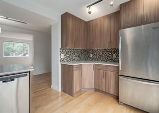 Photo 12: 836 68 Avenue SW in Calgary: Kingsland Semi Detached (Half Duplex) for sale : MLS®# A1250155