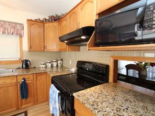 Photo 4: 60 HARVEST OAK Place NE in CALGARY: Harvest Hills Residential Detached Single Family for sale (Calgary)  : MLS®# C3604769
