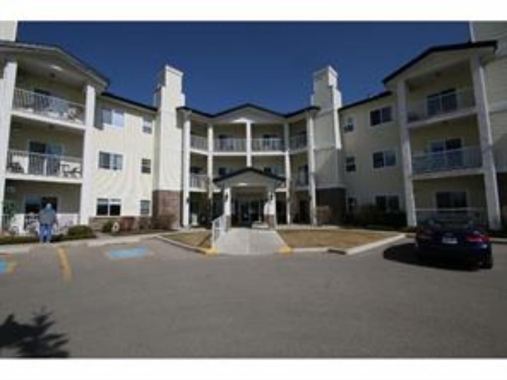 Main Photo: 304 72 Quigley Drive: Cochrane Apartment for sale : MLS®# A1196956
