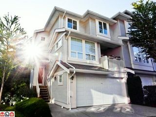 Photo 1: 68 14952 58TH Avenue in Surrey: Sullivan Station Townhouse for sale in "HIGHBRAE" : MLS®# F1116716