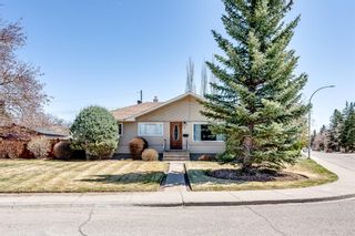 Photo 1: 4 Wedgewood Drive SW in Calgary: Wildwood Detached for sale : MLS®# A1218487